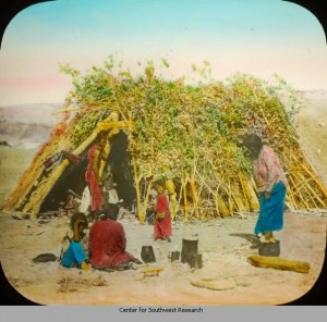 Navajo Family by Wood Stick Hogan