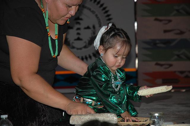 Little Navajo Girl Grinding Corn