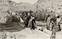 Navajo Men and Women Dipping Sheep. [ca. 1920]